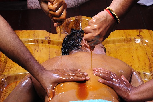 Pizhichil continuous oil therapy treatment